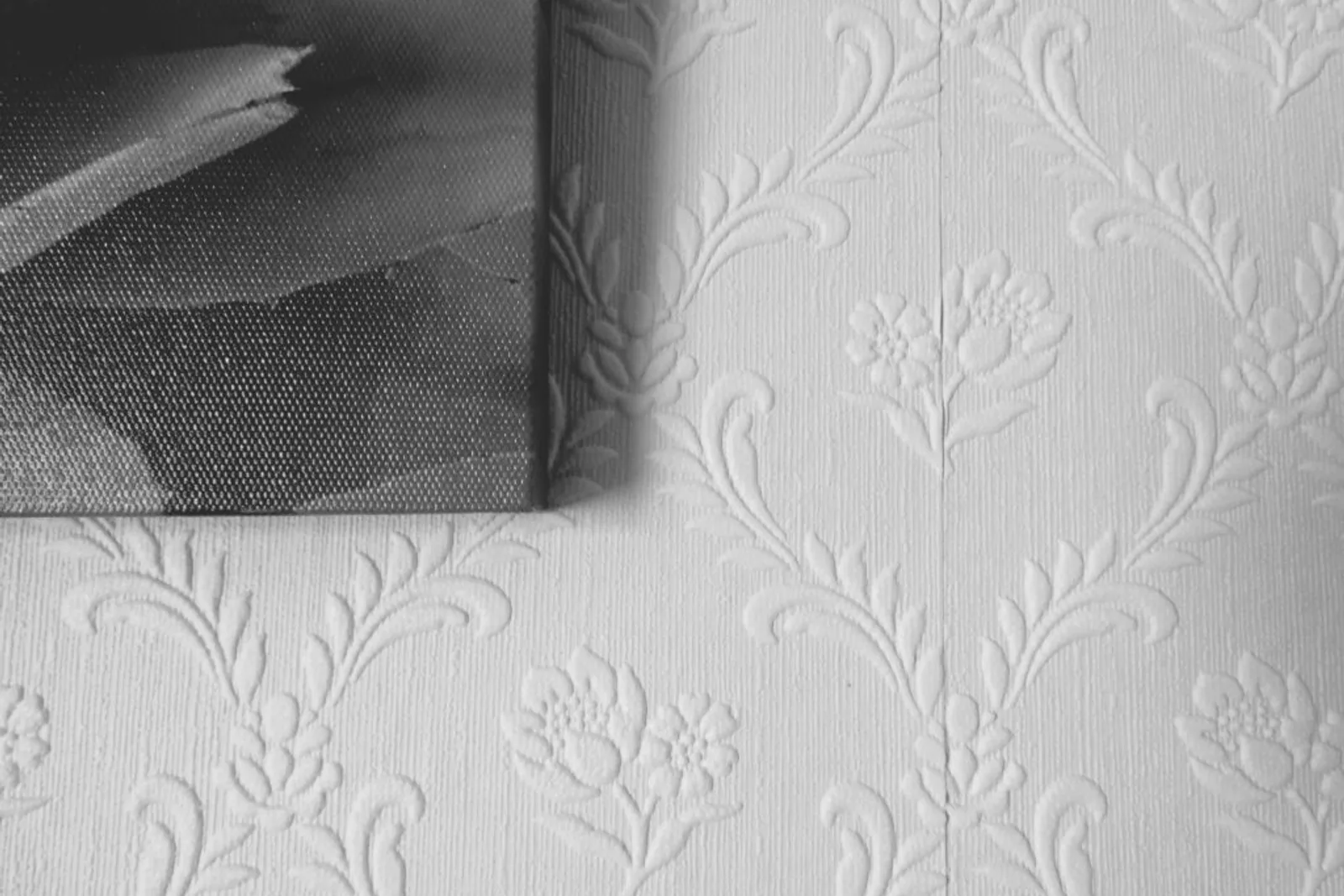Can you wallpaper over textured walls?