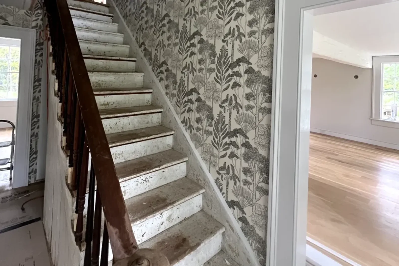 Decorative Wallpaper Installed On Stair Risers Adding A Unique Touch To The Staircase