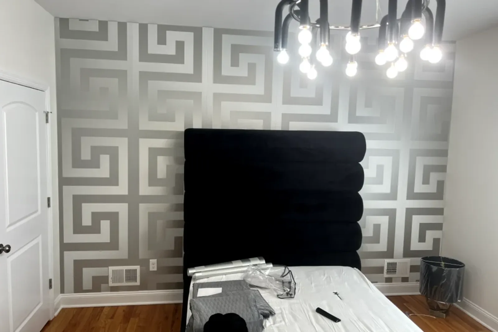 Close Up Of Elegant Patterned Wallpaper Installed In A Bedroom