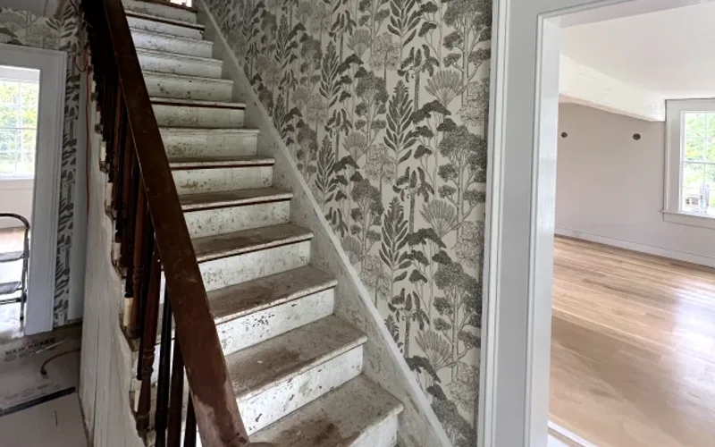 Stair wall wallpaper installation by RCP Wallpaper