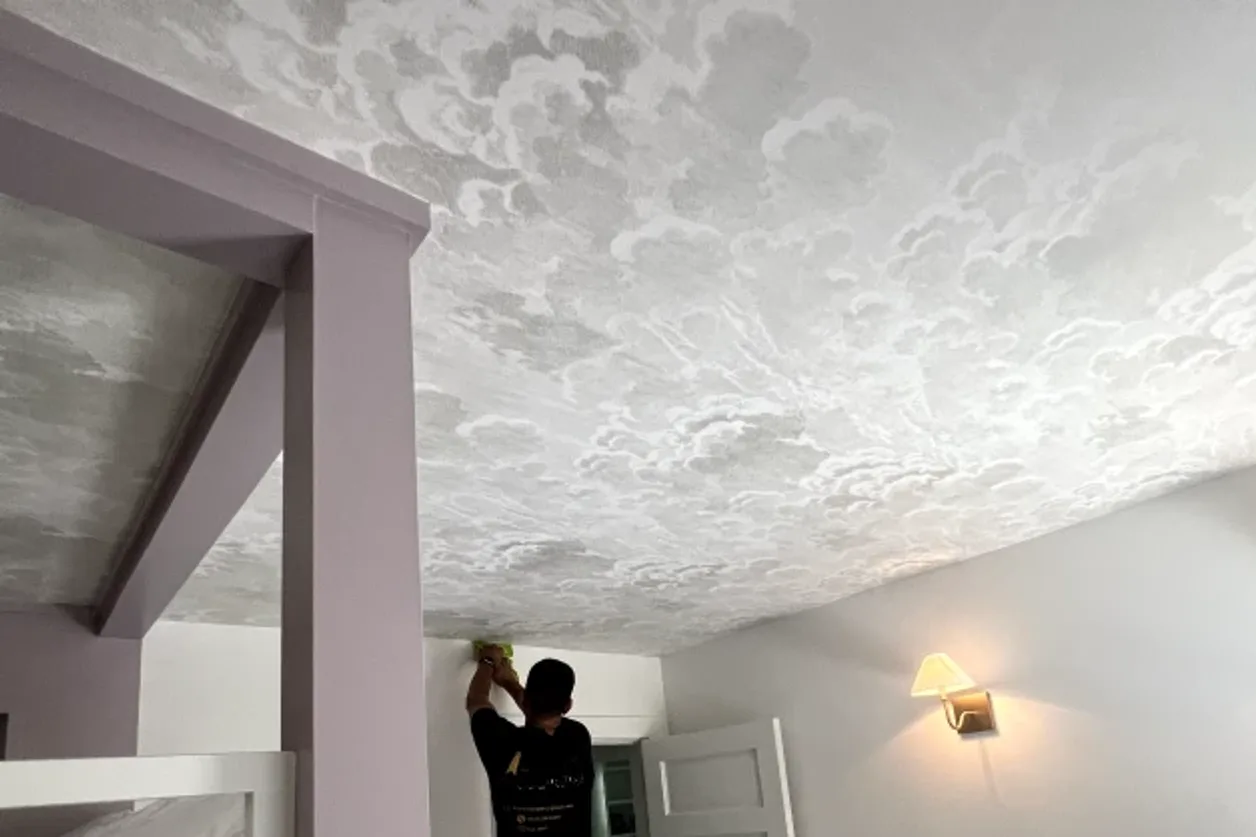 Patterned wallpaper installation on a ceiling by RCP Wallpaper